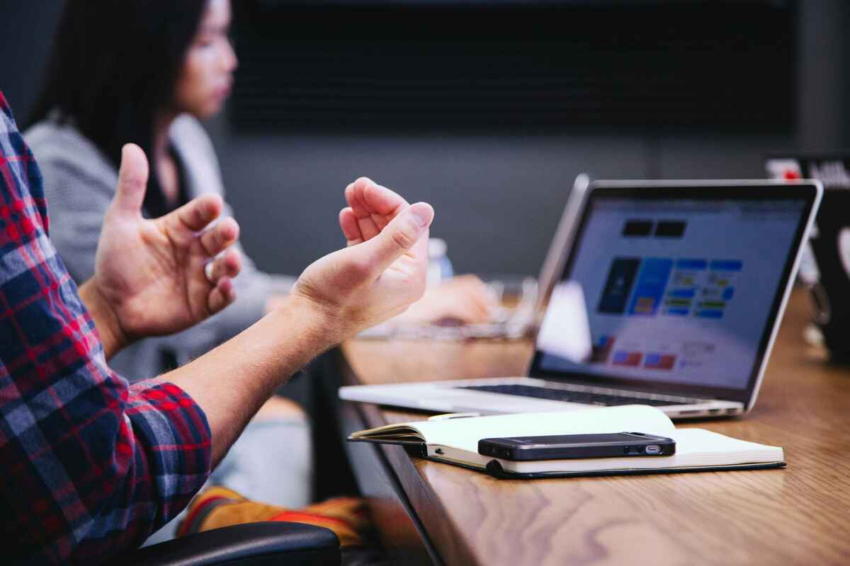 hands of person discussing Automating processes with SharePoint